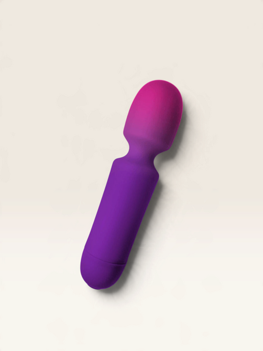 LLibertà Rocks-Off Glo-Girl purple mini wand vibrator with a flexible silicone head and ergonomic design